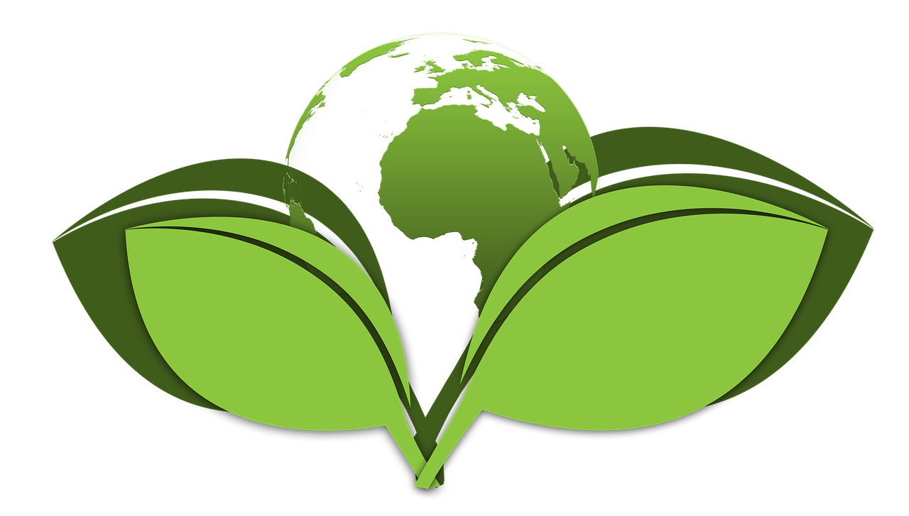 Kula ziemska z zielonymi kontynentami w objęciach dwóch liści