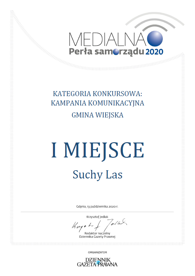 Dyplom informujący o przyznaniu Gminie suchy Las pierwszego miejsca w konkursie Medialne Perły Samorządu.
