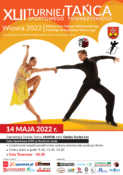 Plakat z zapowiedzią imprezy. Główny plan para taneczna w latino.